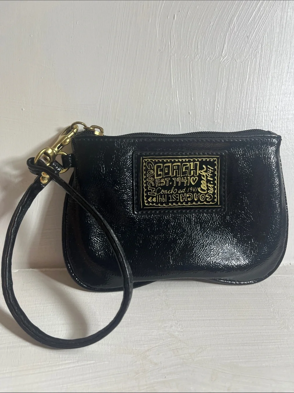 Coach Poppy Black Patent Leather Wristlet with Gold Accents